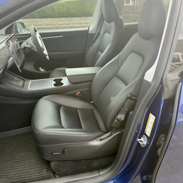 Front seats and cabin inside the EV Rider Tesla Model Y